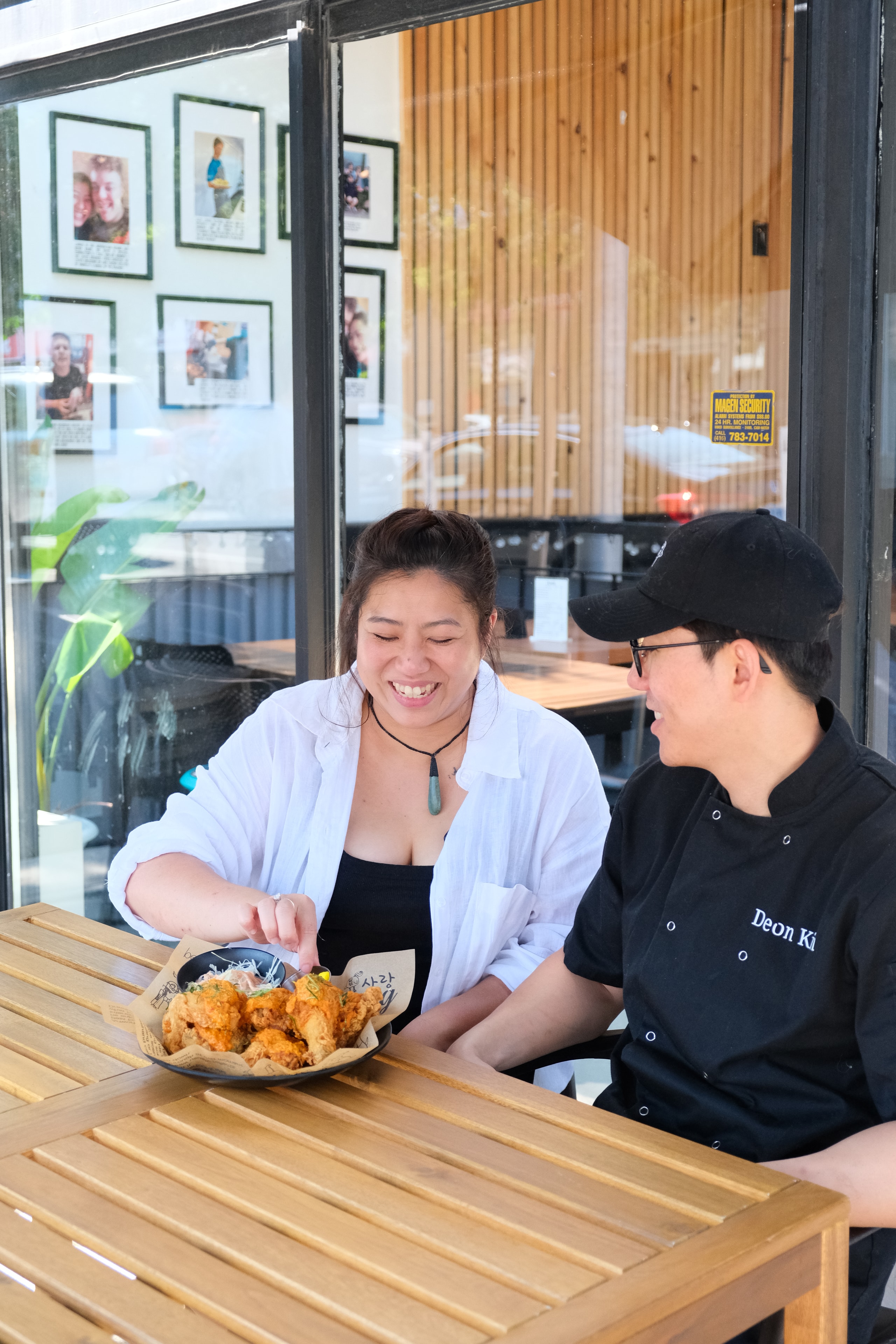 Deon and Jennifer enjoying Sarang Kitchen chicken